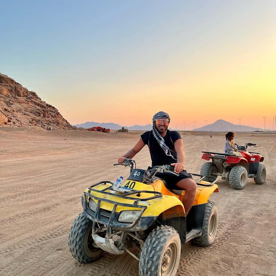 Quad Biking Tour in Sharm El Sheikh Desert - Getting there: the air-conditioned shuttle makes desert days easier